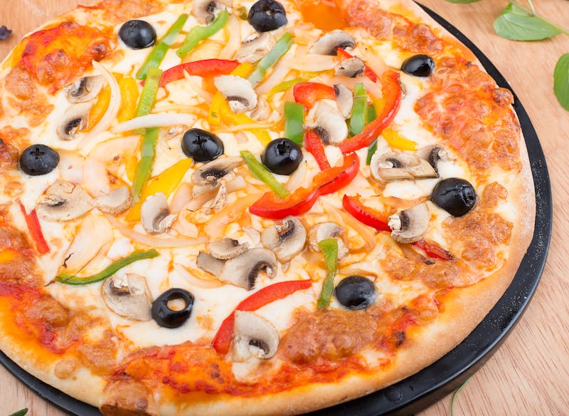 Vegetarian Garden Harvest pizza with colorful vegetables