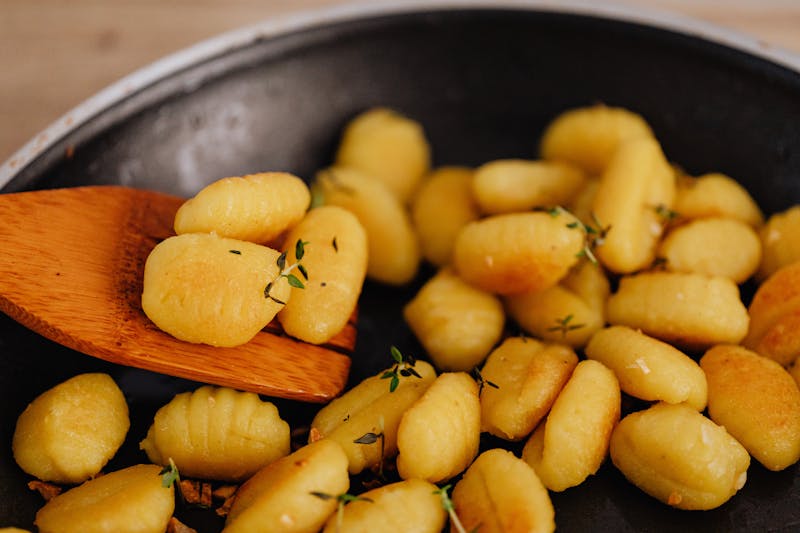 Golden garlic knots brushed with herb butter