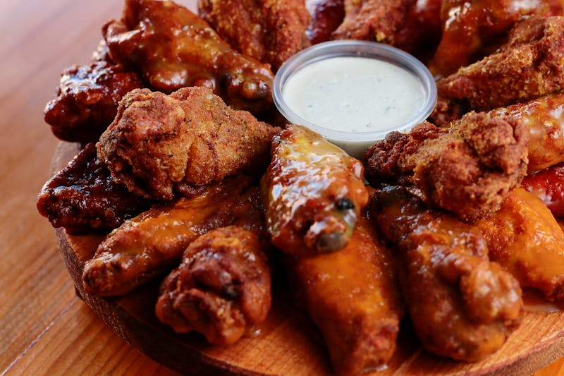 Crispy chicken wings with buffalo sauce